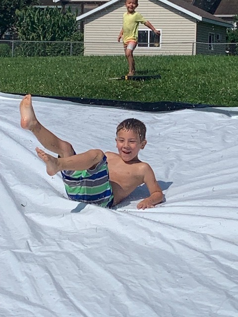 Student on Water Slide