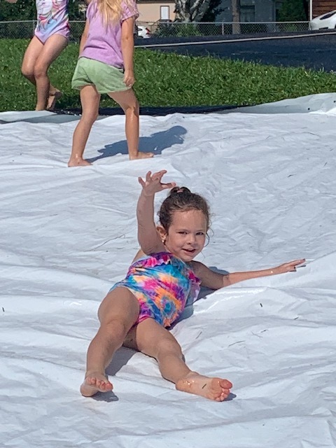 Student on Water Slide