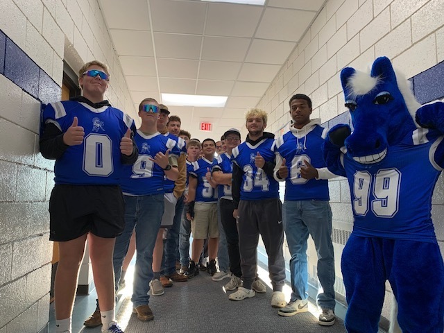 Football Players and Pony