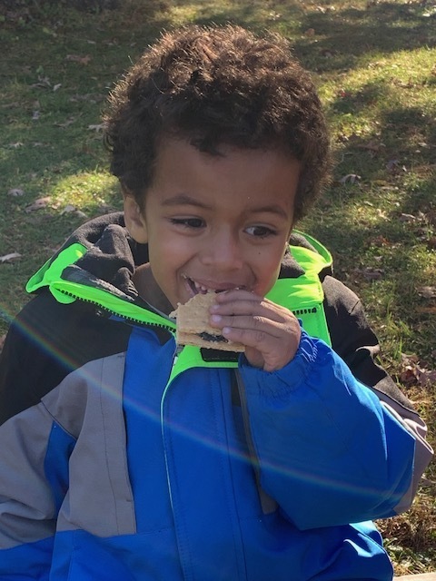 First Grader Eating a S'more