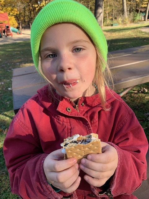 First Grader Eating a S'more