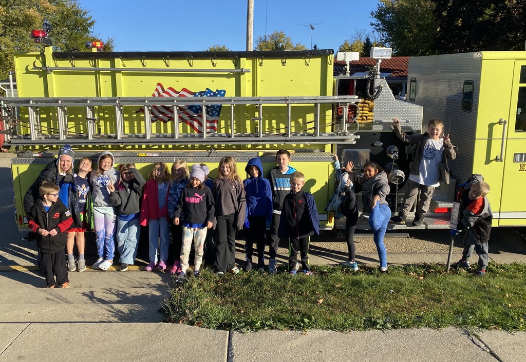 Third Grade Teacher and Students with Fire Truck