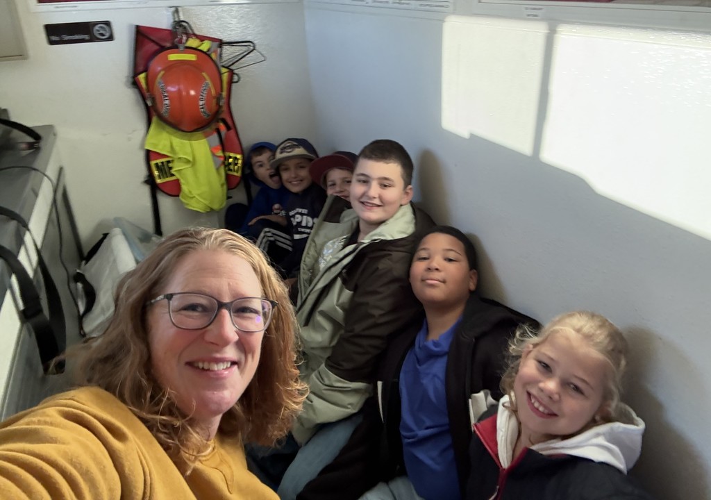 Teacher and Students in Fire Truck
