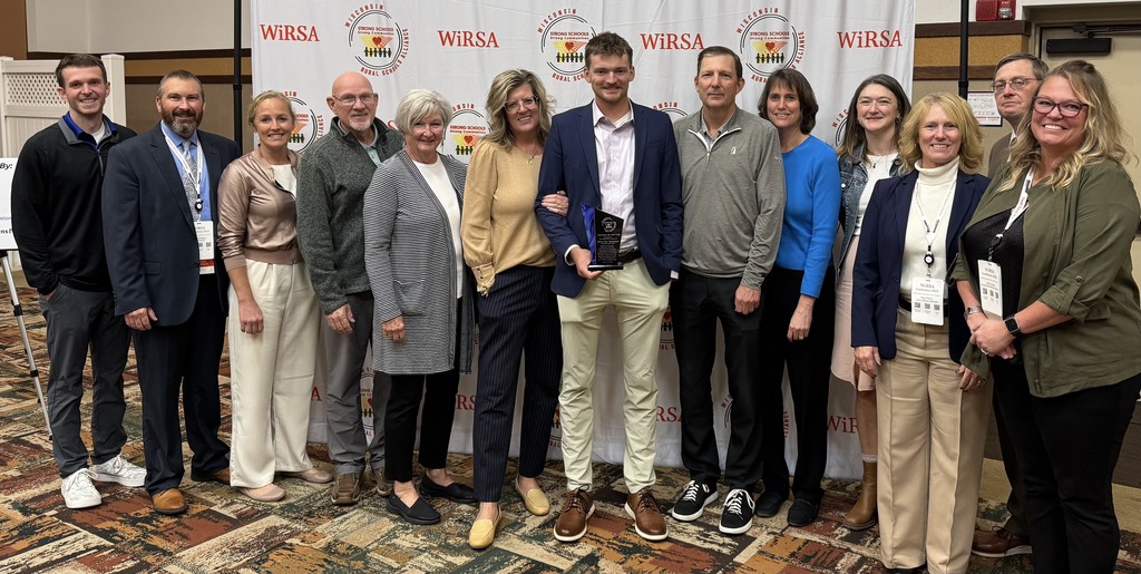 Monticello Staff and Gustafson Family Accepting the WiRSA Princiapal of the Year Award for Mr Gustafson