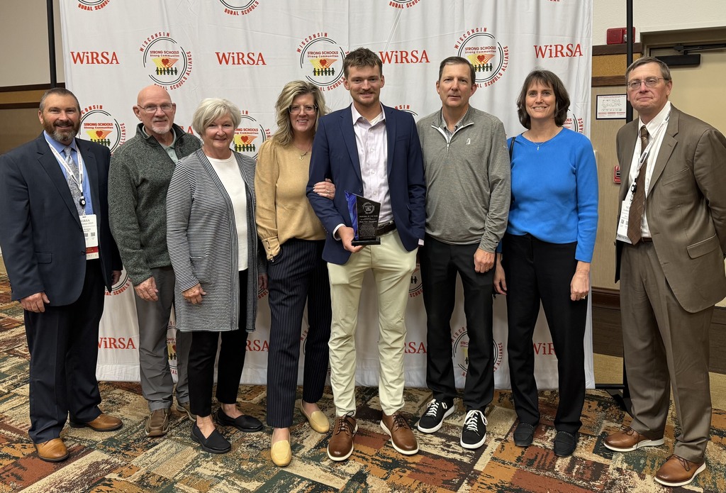 Monticello Staff and Gustafson Family Accepting the WiRSA Principal of the Year Award for Mr Gustafson