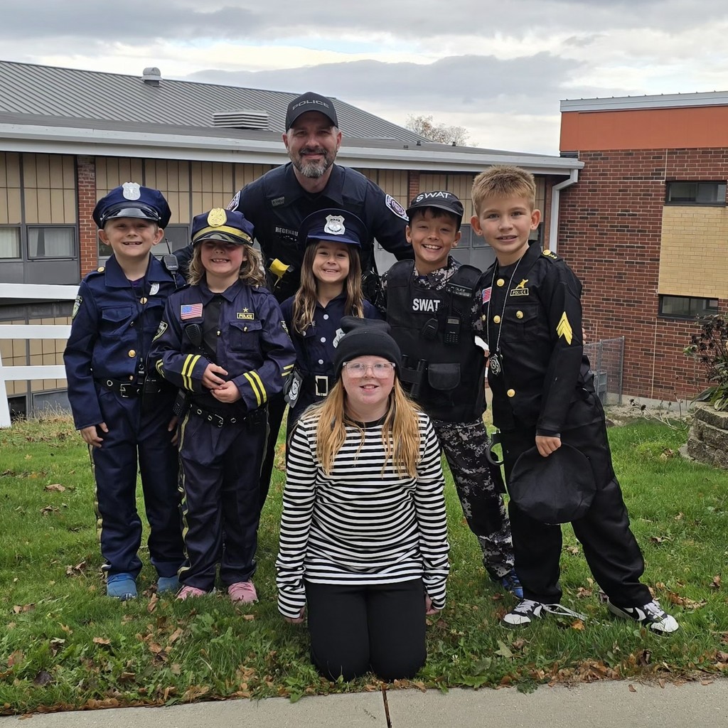 Monticello Police Chief and Student Police Officers Dressed Up for Halloween