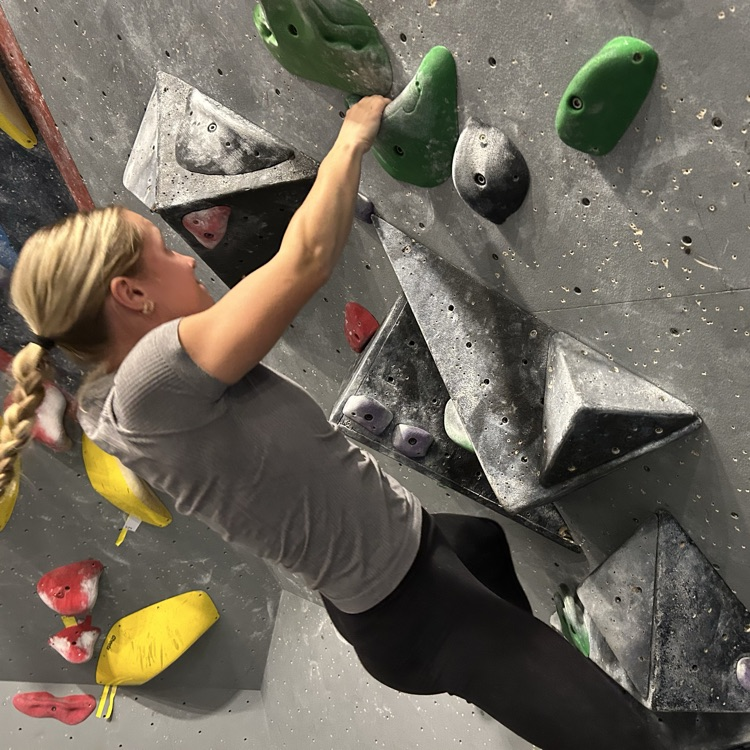 Student on Rock Climbing Wall