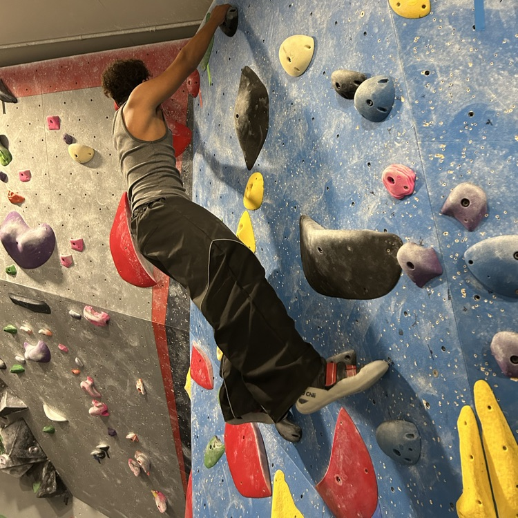 Student on Rock Climbing Wall