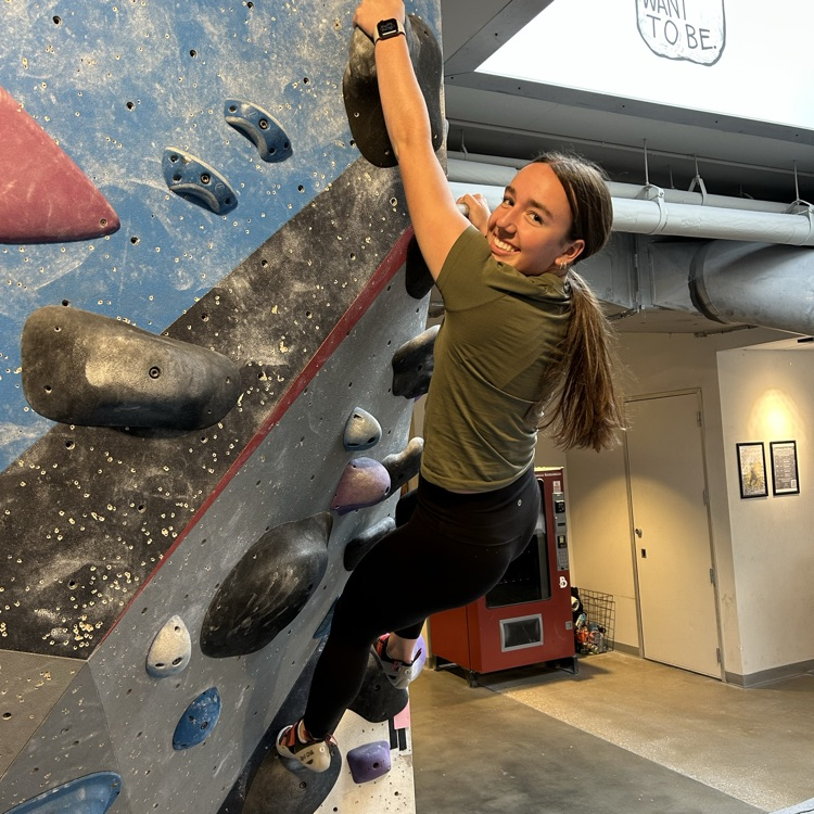 Student on Rock Climbing Wall