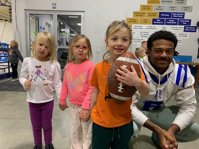 Students at Play with the Ponies