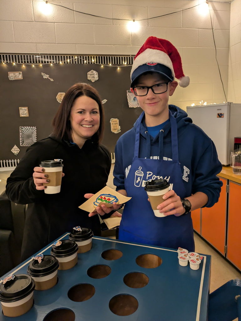 Teacher and Student with Coffee and Cookies