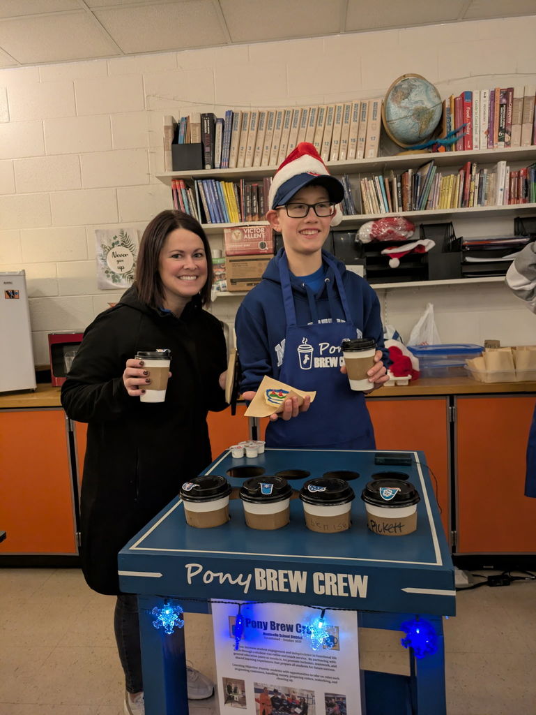 Teacher and Student with Coffee and Cookies