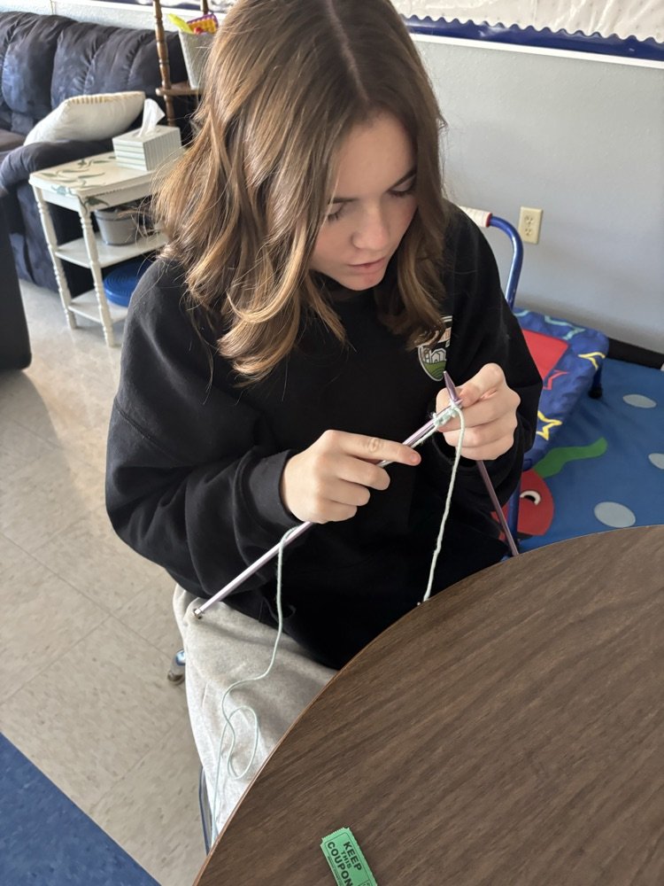 student knitting 