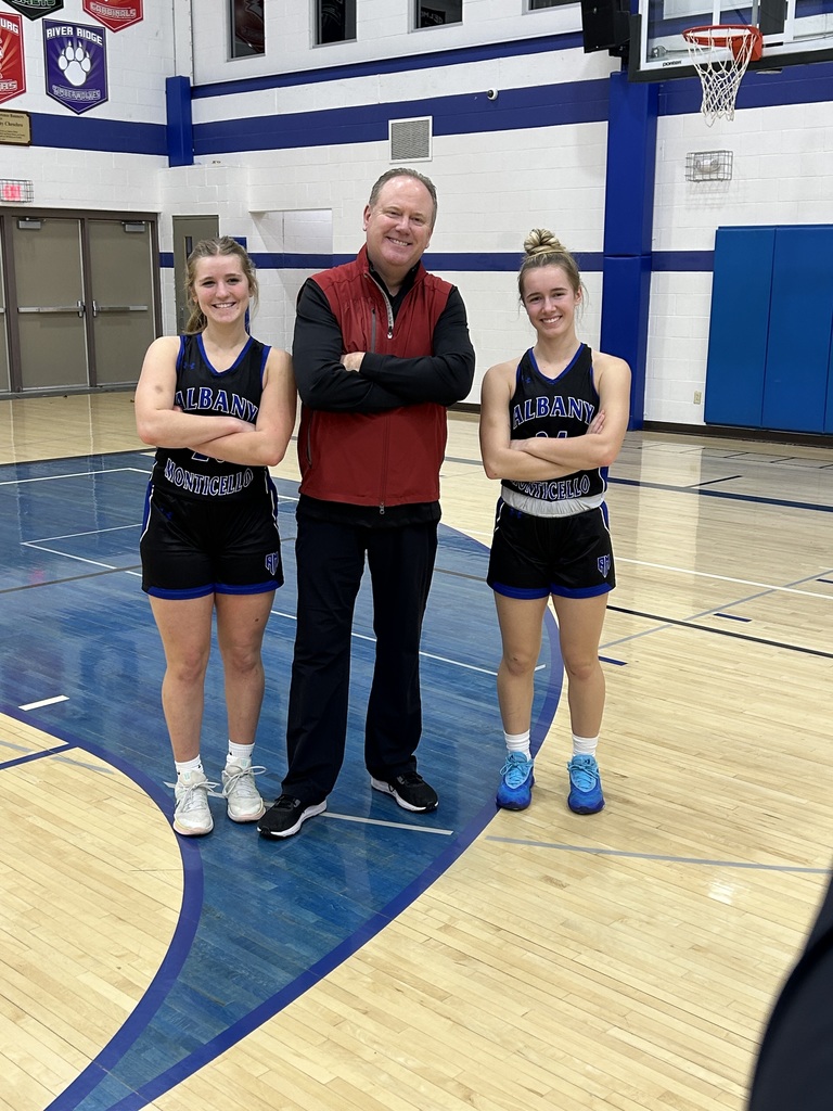 Senior Girls Basketball Players and Badgers Basketball Coach