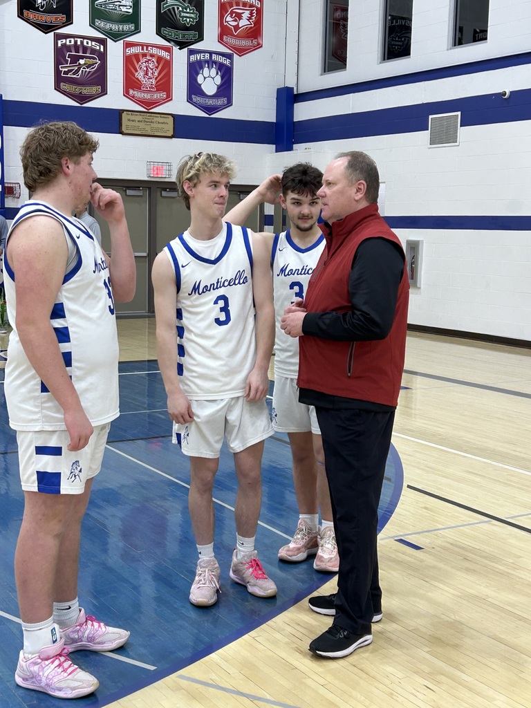 High School Basketball Players and Badgers Coach