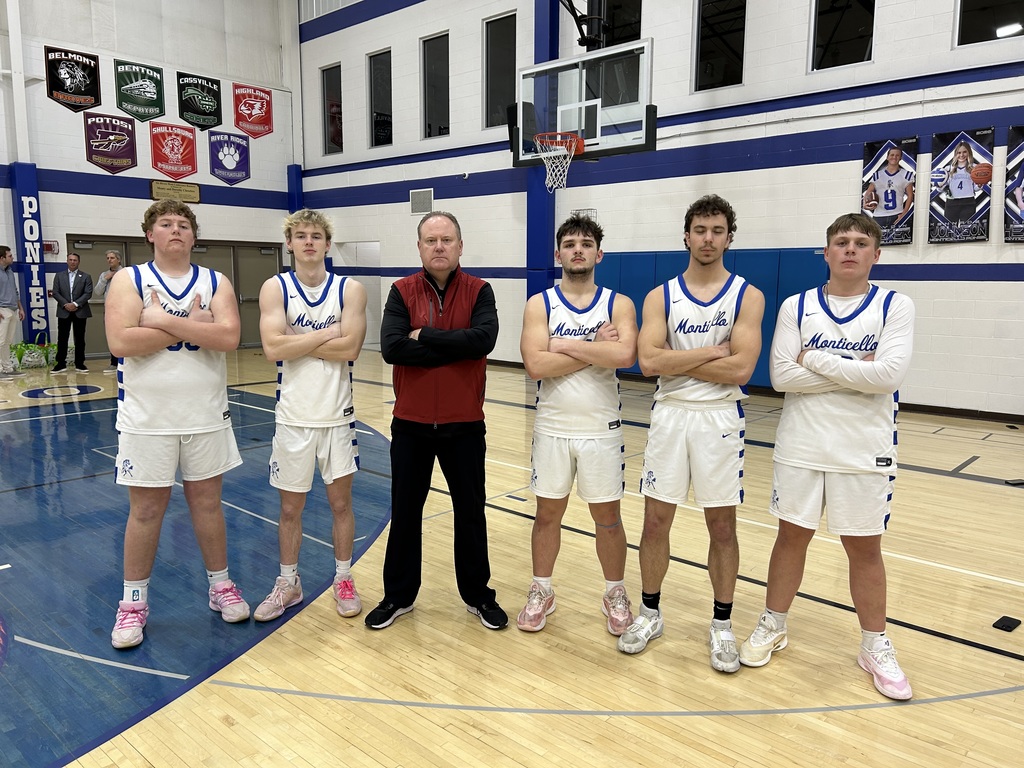 High School Basketball Players and Badgers Coach