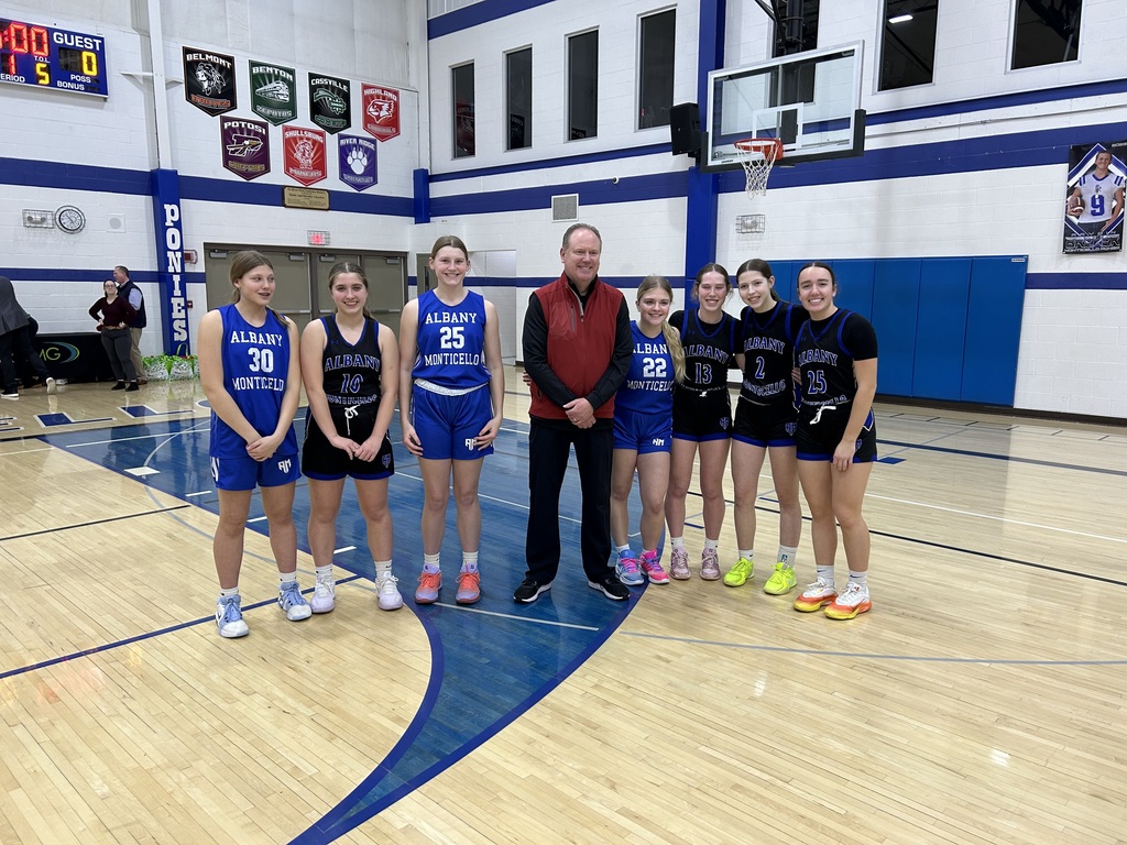 High School Basketball Players and Badgers Coach