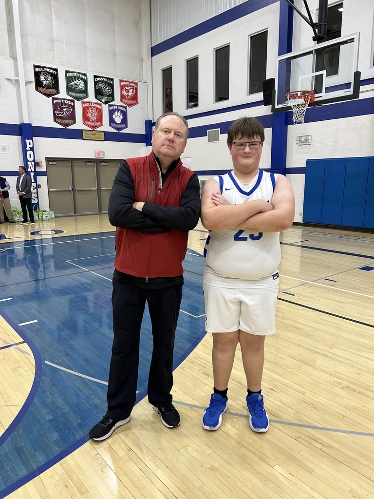 High School Basketball Player with Badgers Coach