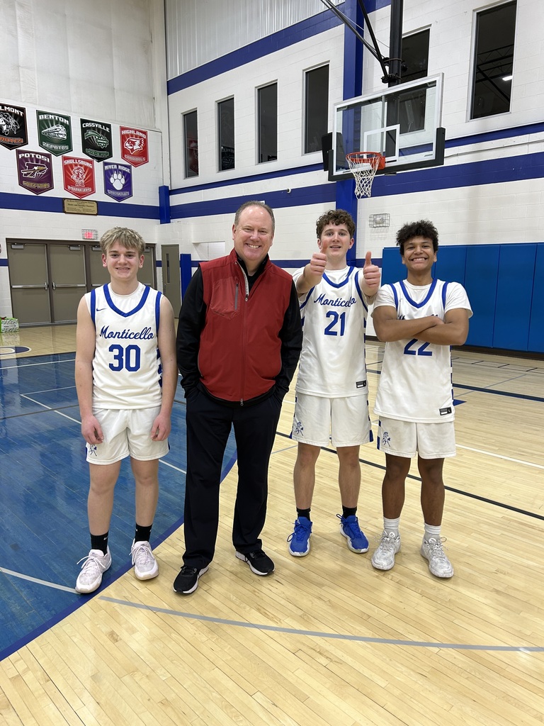 High School Basketball Players and Badgers Coach