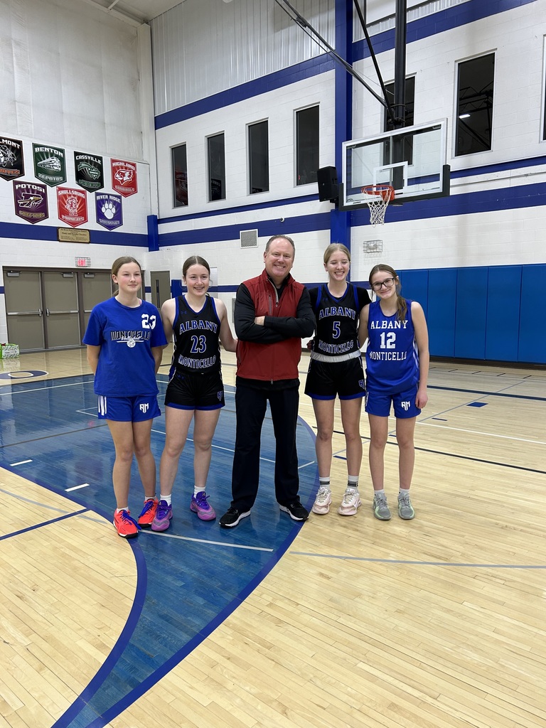 High School Basketball Players and Badgers Coach