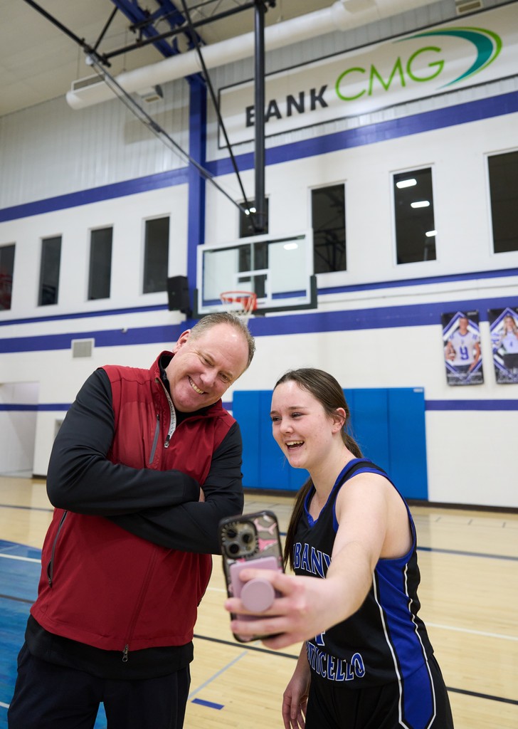 Coach and Girls Basketball Player