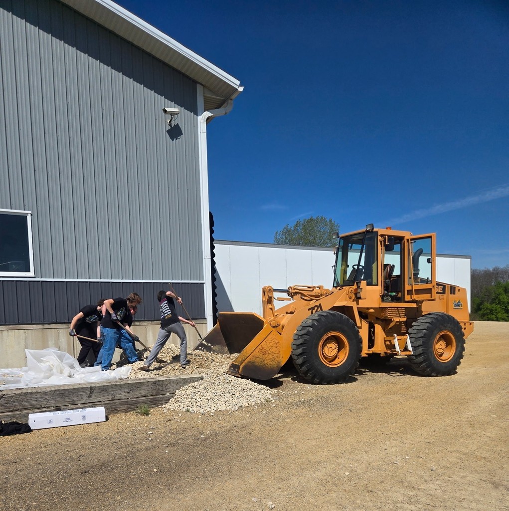 students shoveling