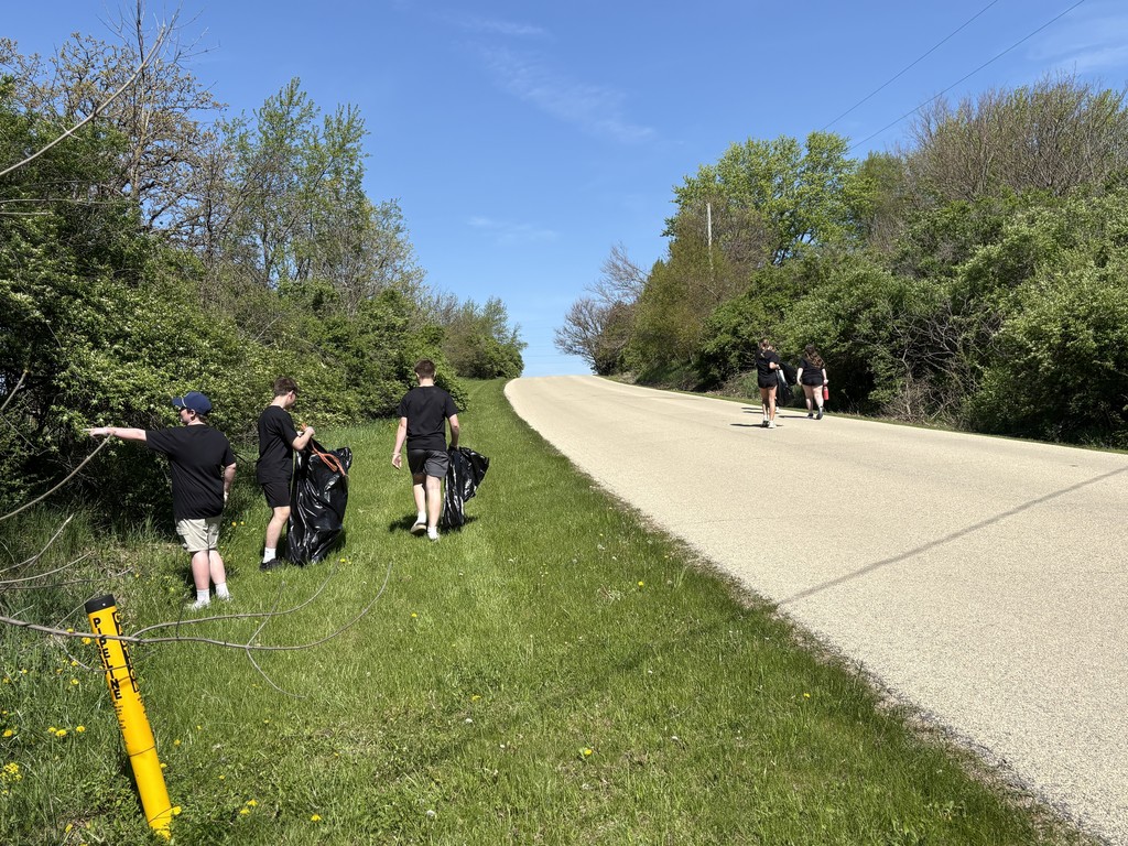 students picking up trash