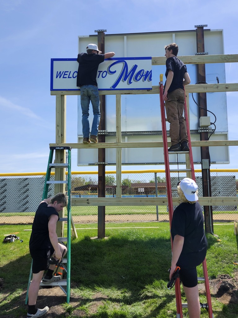 students putting sign up
