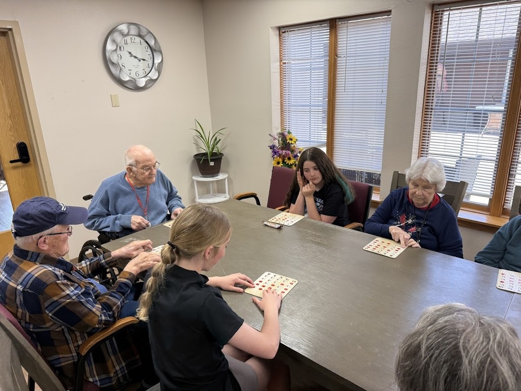 students and residents playing bingo
