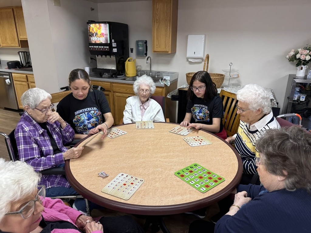 students and residents playing bingo