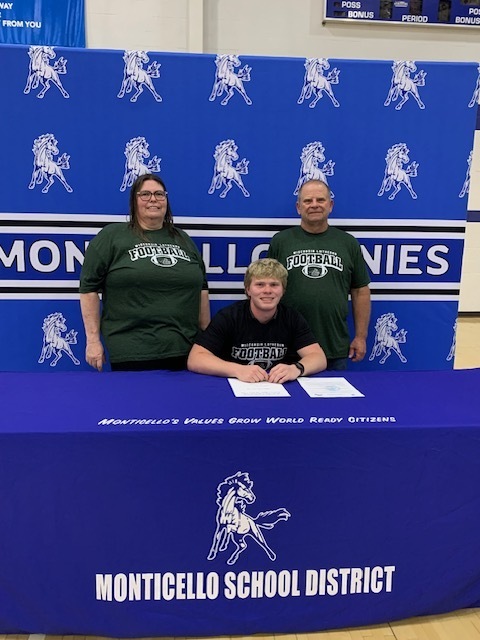 student athlete with parents
