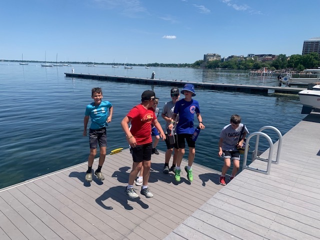 students at lake