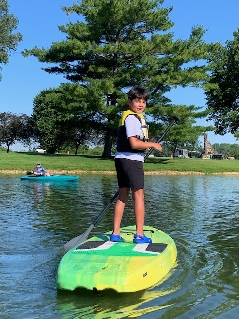 boy on paddleboard