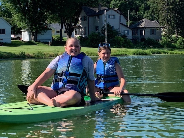 girls paddleboarding