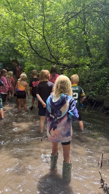 2nd-4th graders hiking at Nature of the Confluence in Beloit, WI