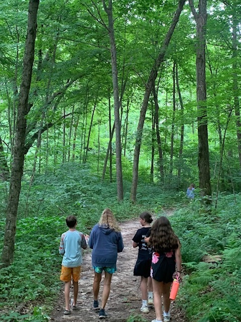 One teacher and 3 middle school students on a trail at Governor Dodge State Park