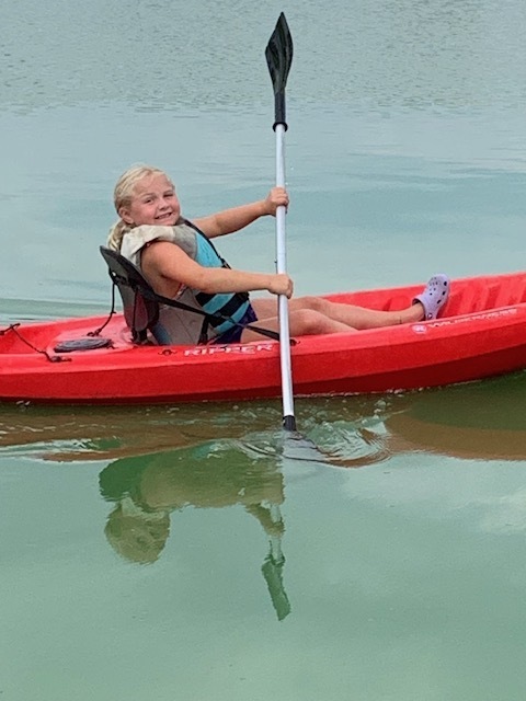 elementary student kayaking