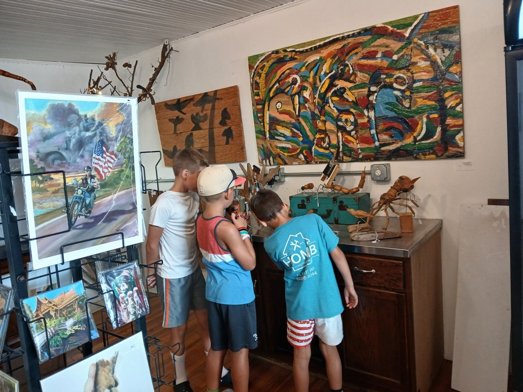 three elementary students at the art gallery in Monticello, WI