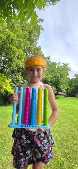 elementary student playing yard game