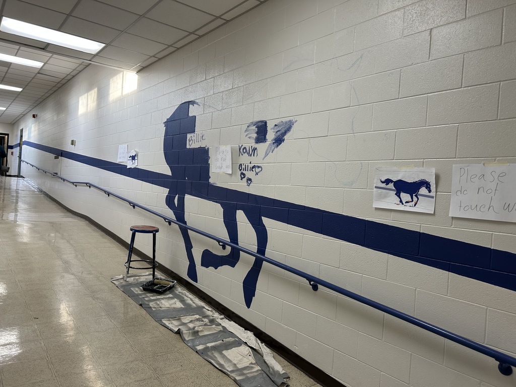 Close-up of painted Ponies featured in a student-created mural near the Tech Ed Shop.