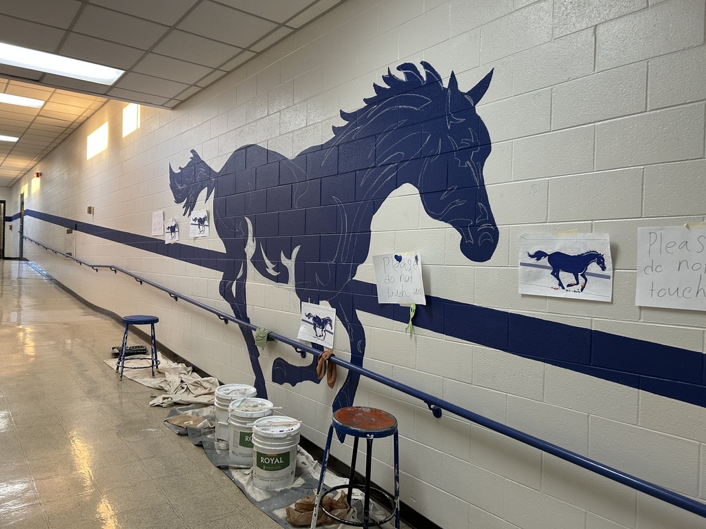 Close-up of painted Ponies featured in a student-created mural near the Tech Ed Shop.