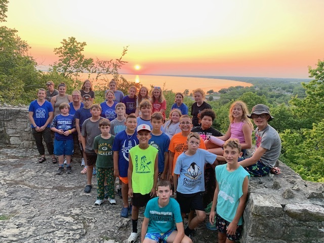students and teachers at High Cliff State Park at sunset