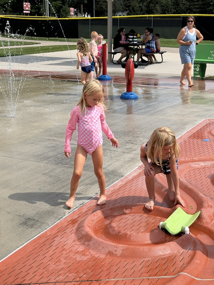 students at splash pad
