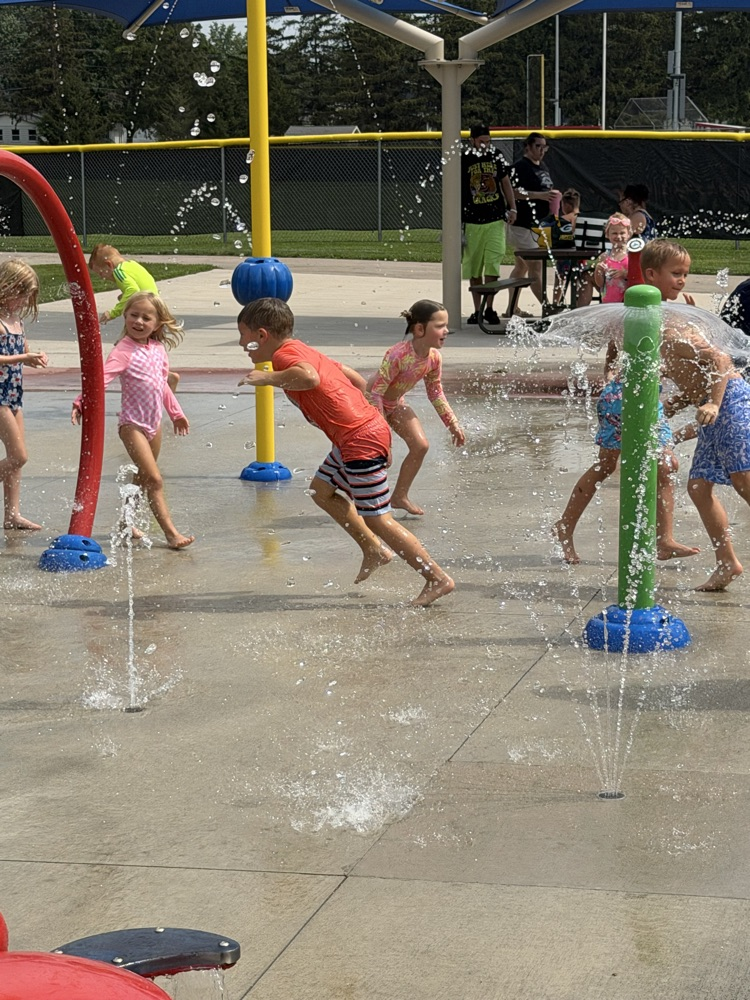 students at splash pad
