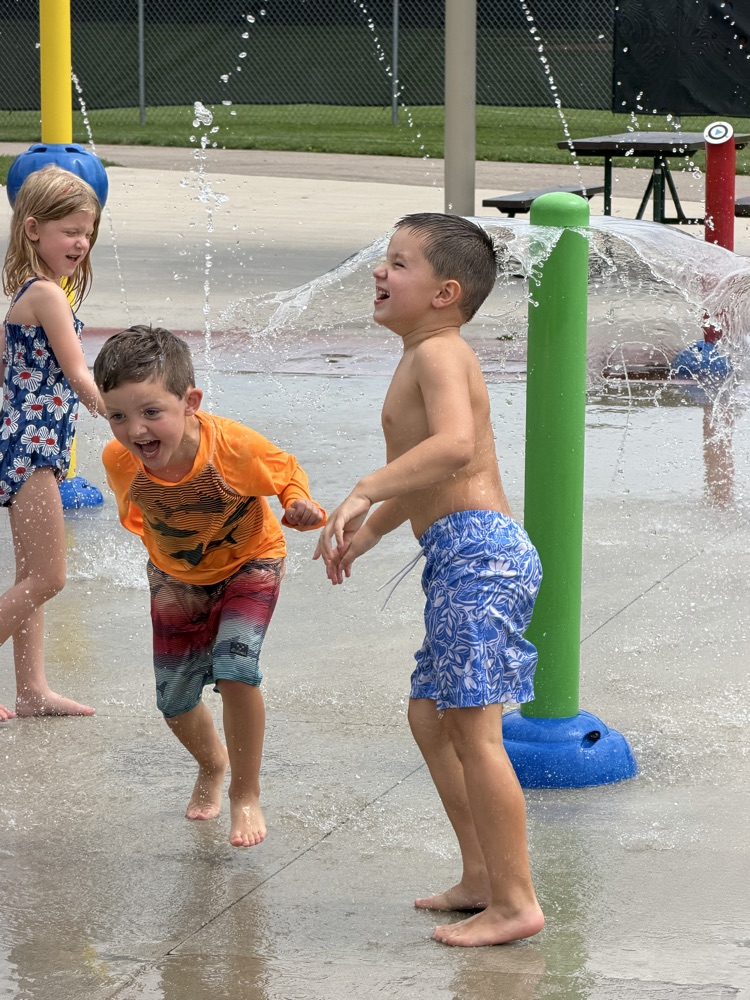 students at splash pad