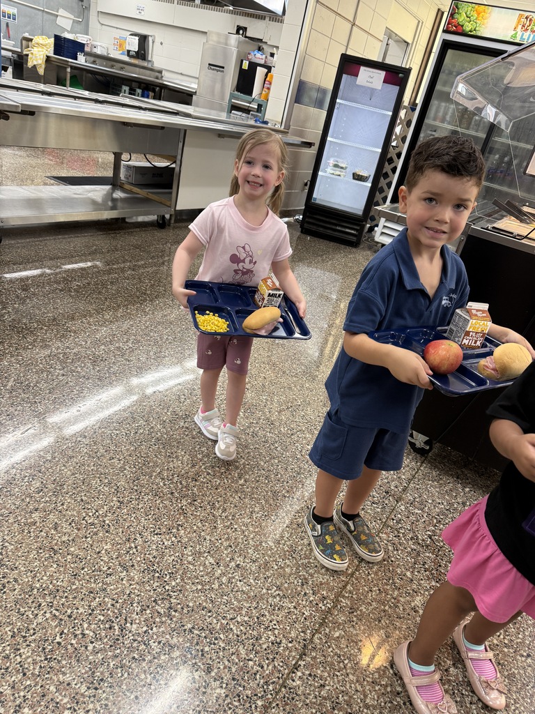 Kids getting lunch in cafeteria