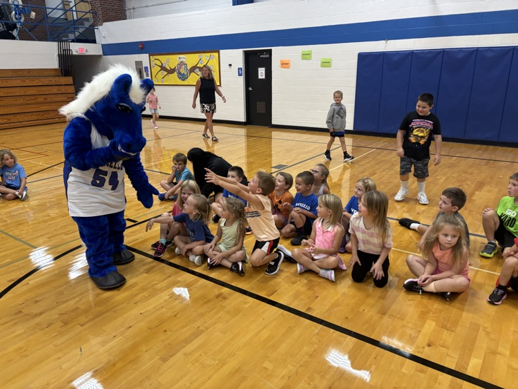 students with a blue pony
