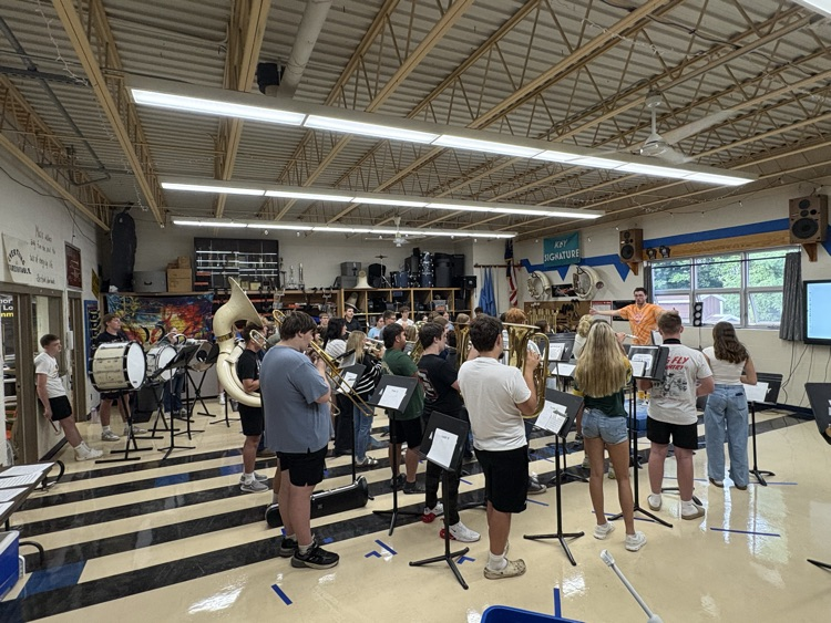 high school band and teacher