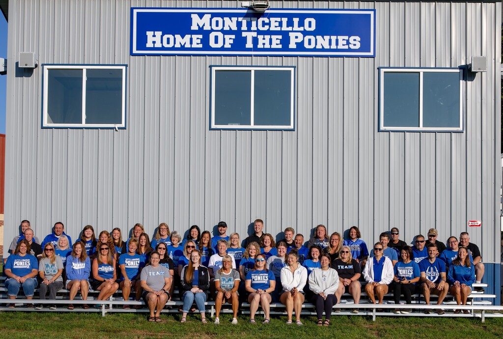 monticello staff in front of football press box