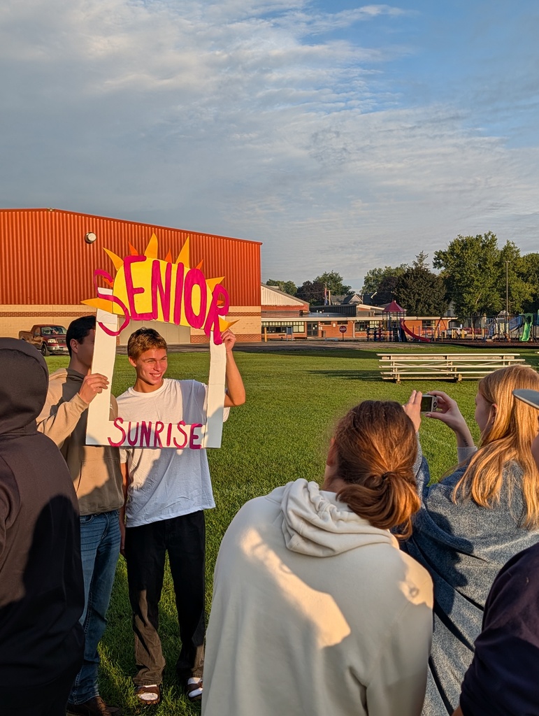 senior students smiling and taking pictures